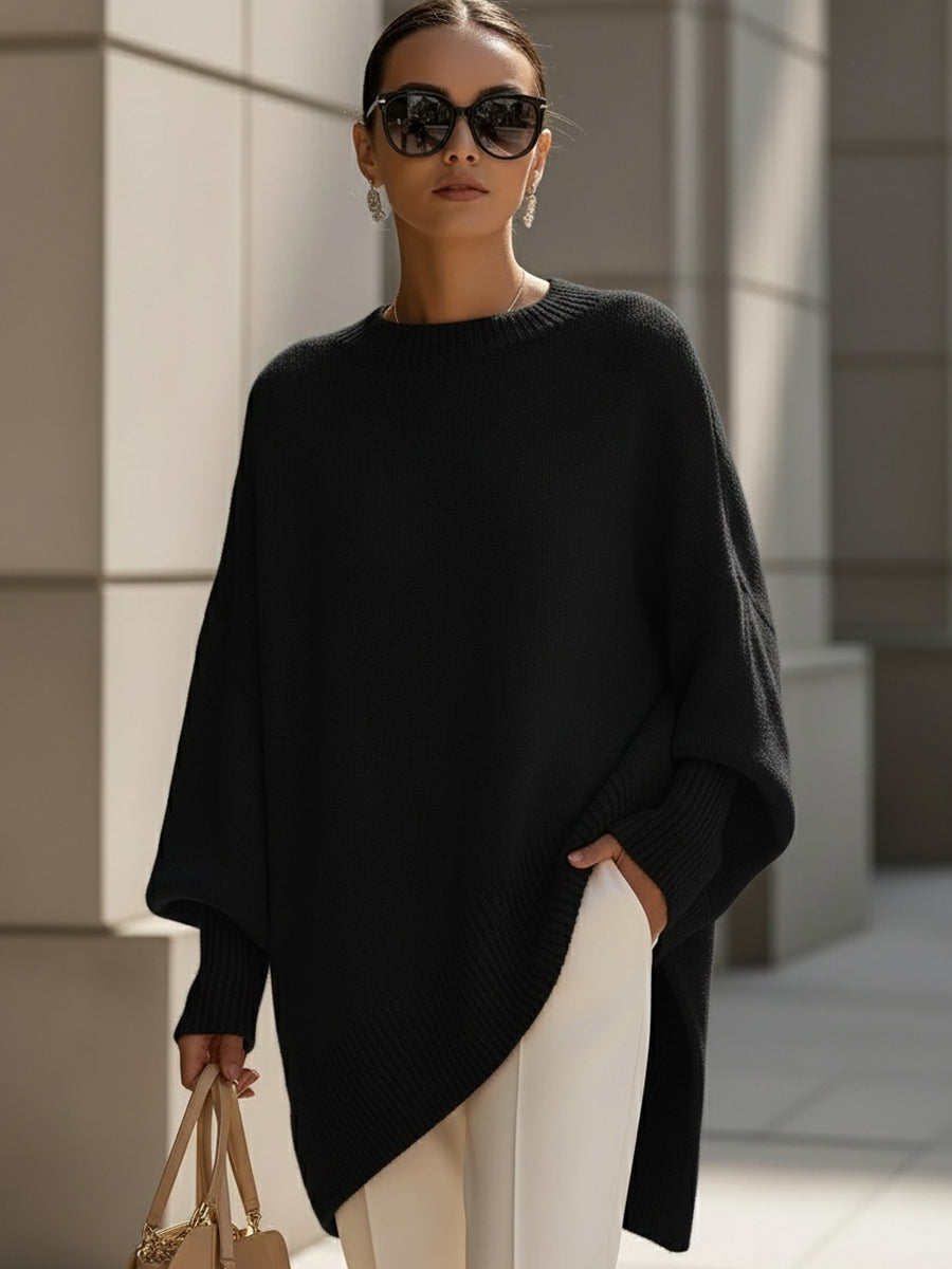 Cozy women's oversized knit sweater, long sleeve. Ideal for fall fashion, comfortable everyday wear.