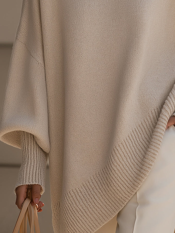 Stylish oversized knit long sleeve top for women. Cozy fall essential, easy winter layering.