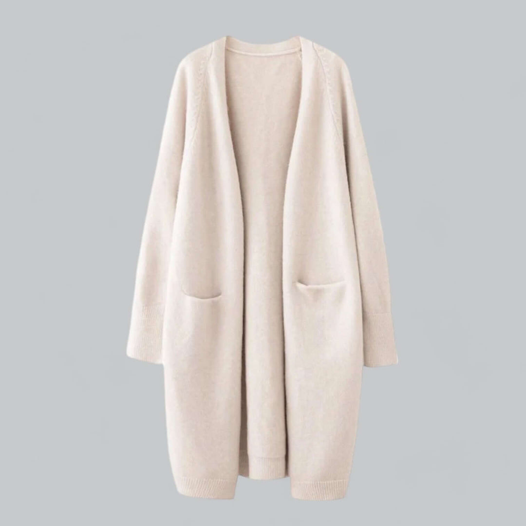 Women's oversized knitted cardigan, cozy chic style for fall & winter layering.