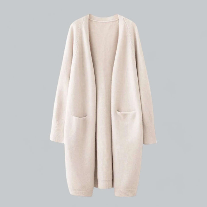 Women's oversized knitted cardigan, cozy chic style for fall & winter layering.