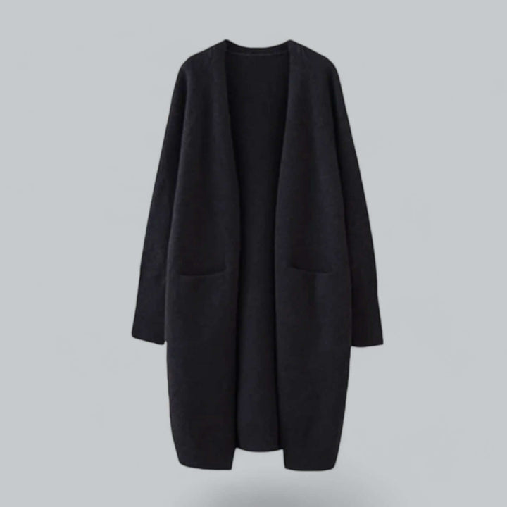 Stylish women's oversized knitted cardigan, casual yet chic for versatile layering outfits.