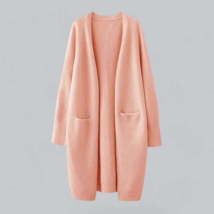 Relaxed fit women's oversized knitted cardigan, offering cozy comfort & stylish look.