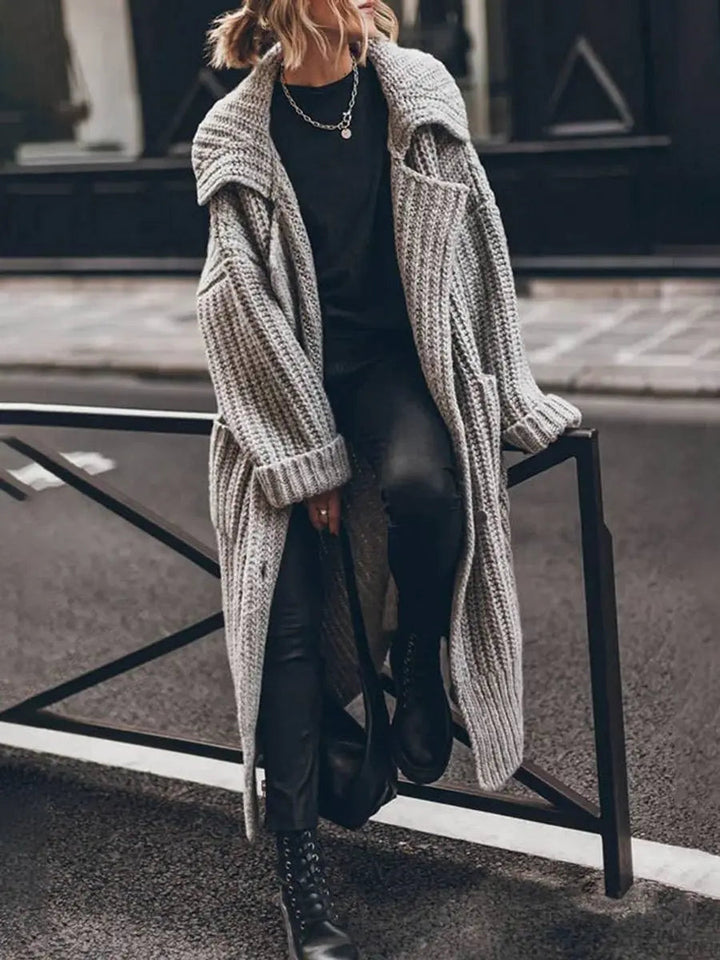 Women's oversized lapel longline cardigan, perfect for cozy autumn layering and winter fashion.
