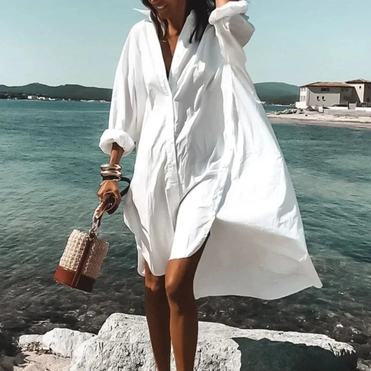 Women's oversized long sleeve shirt dress, breathable fabric, ideal for beach, resort, or casual summer wear.