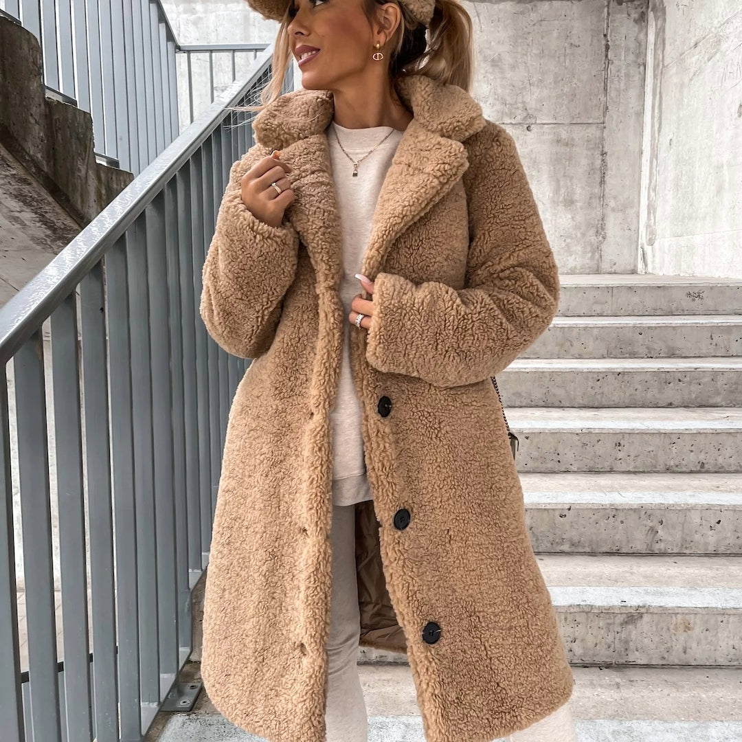 Women's oversized long winter coat, cozy and stylish. A warm outerwear piece for chilly days.
