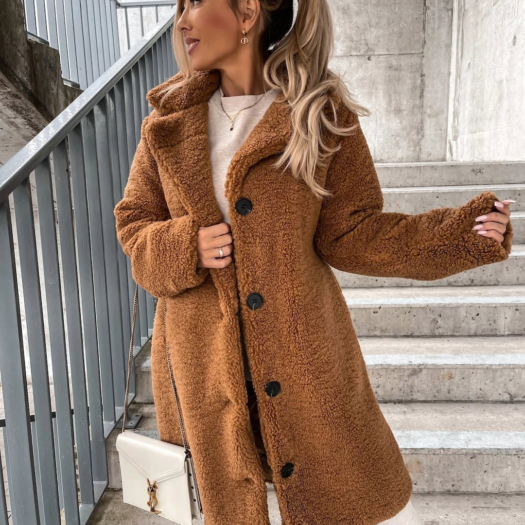 Chic women's oversized long winter coat with a button-front and collared design for ultimate warmth.