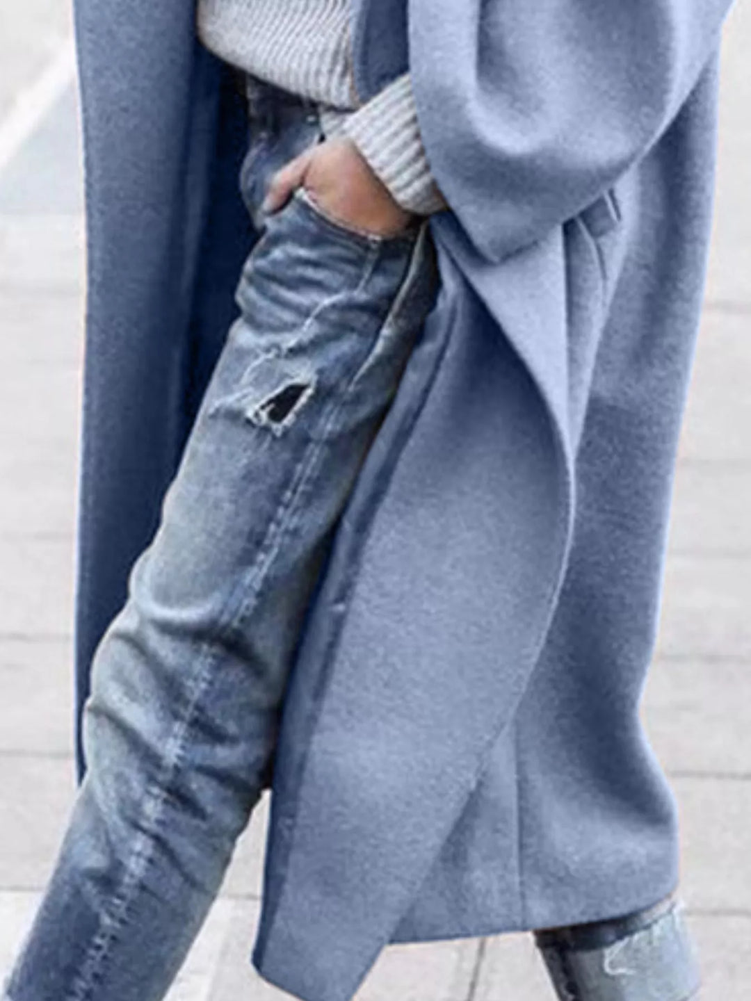 Classic women's oversized long winter coat, a timeless staple for sophisticated winter fashion.