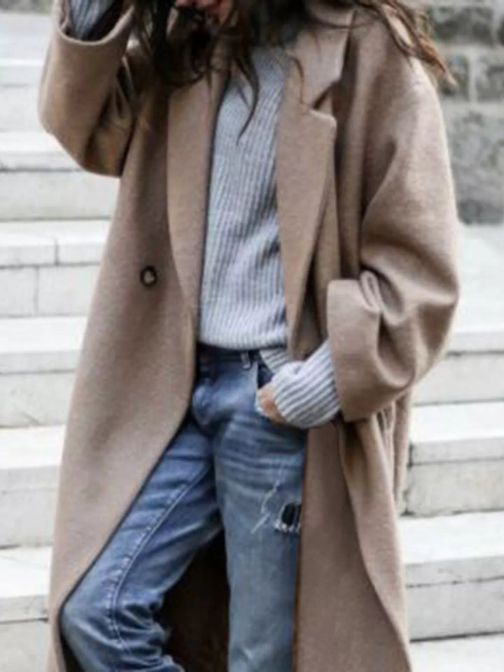 Stylish women's long oversized winter coat, offering a comfortable relaxed fit and ultimate warmth.