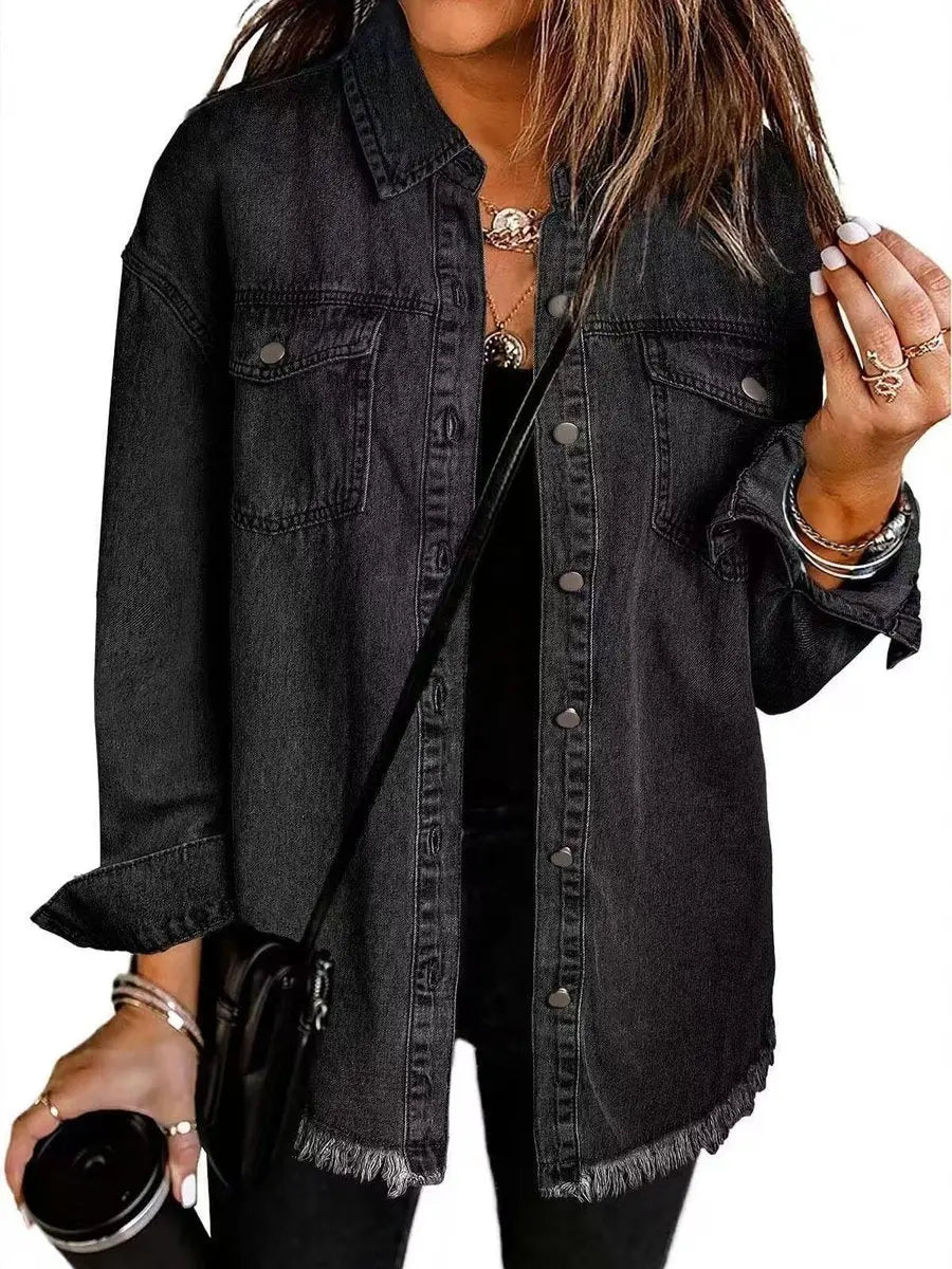 Women's oversized longline jacket with raw hem, snap buttons, and relaxed fit for versatile layering.