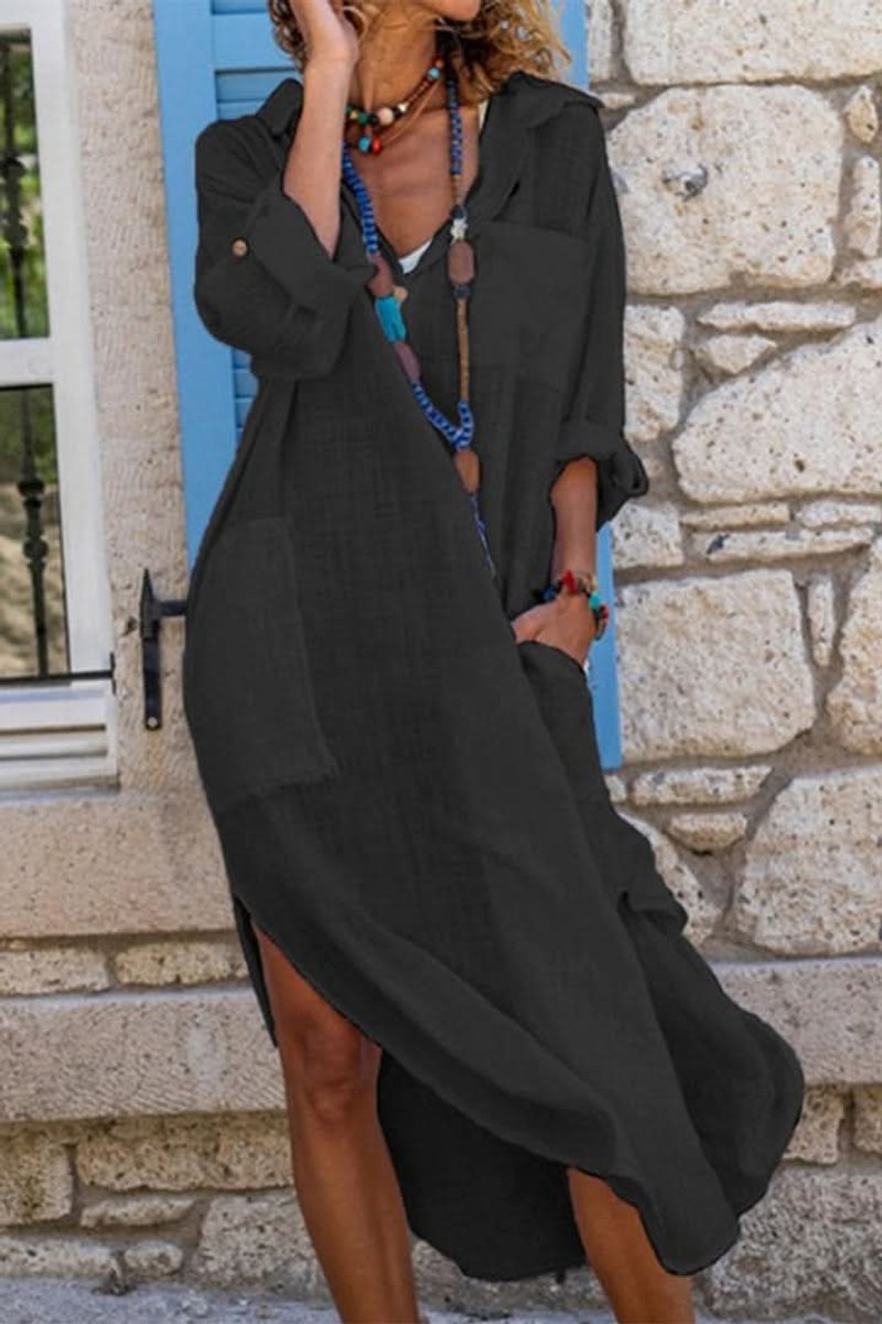 Women's oversized midi shirt dress, perfect for relaxed evening wear or a casual summer outing.