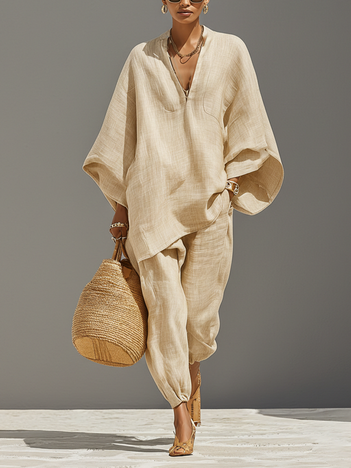 Women's oversized notched top & tapered pant set, perfect for casual or smart casual wear. Comfortable coordinated outfit.