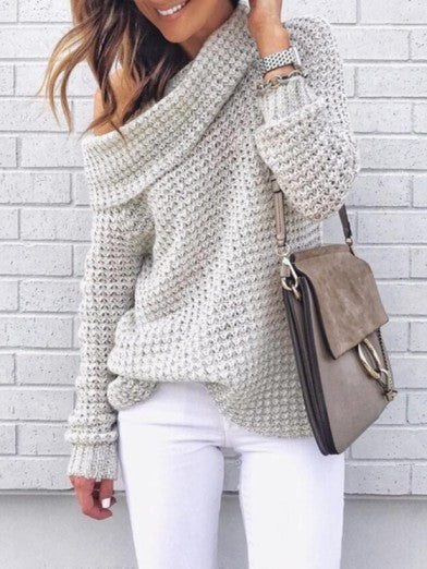 Trendy women's long sleeve off-shoulder sweater. Oversized, elegant, and cozy for stylish fall fashion.