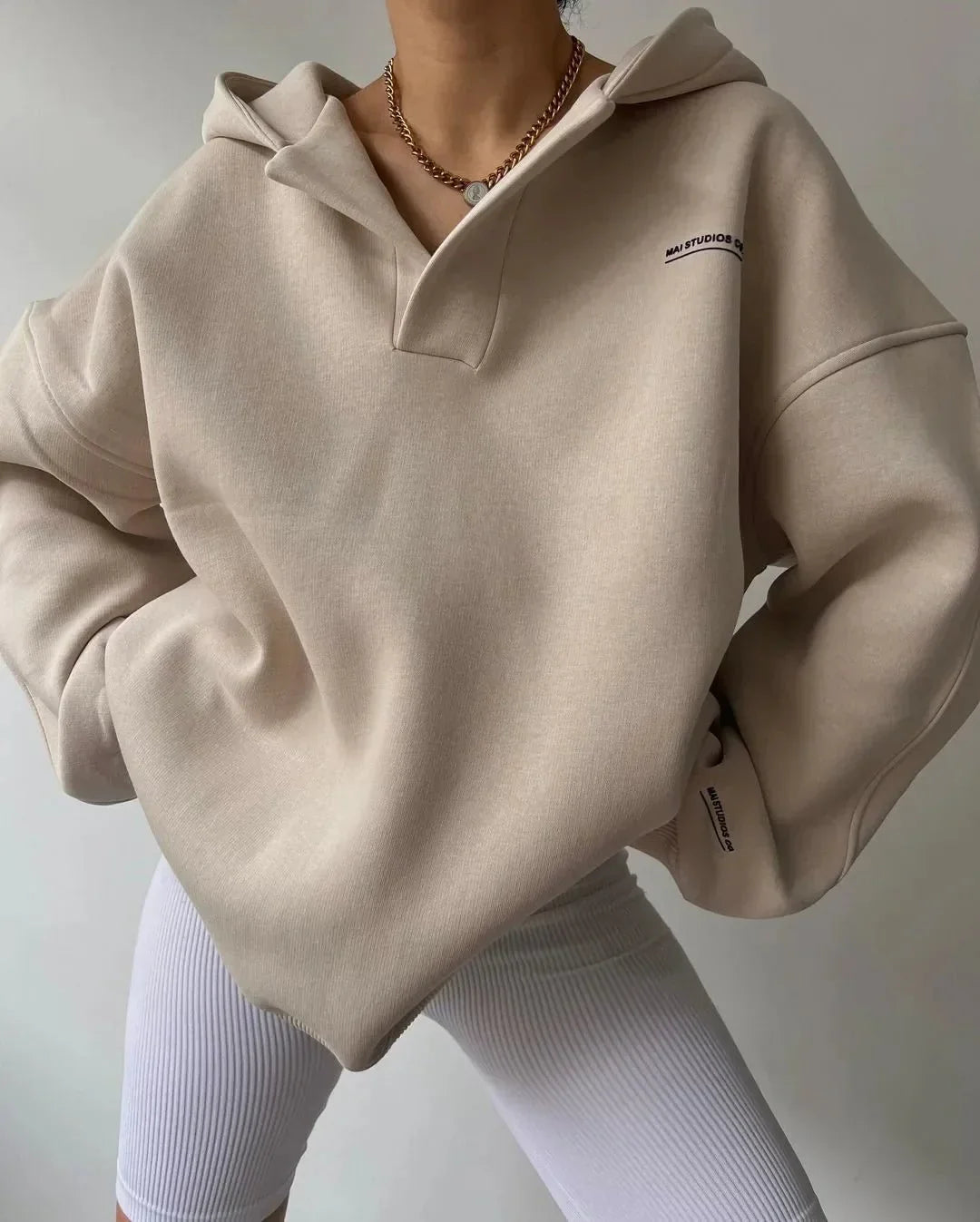 Women's casual oversized hoodie. Pullover style with a relaxed drop shoulder and elegant notch neck.