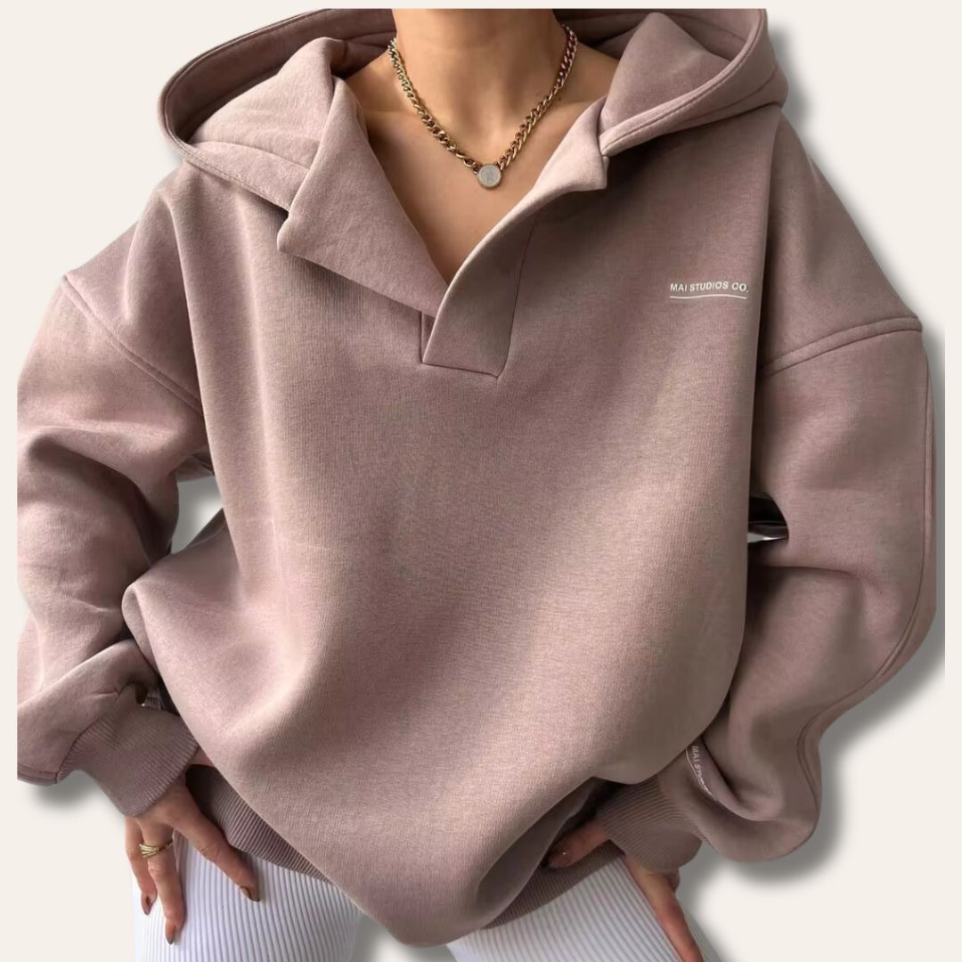 Women's fashion oversized hoodie, a cozy pullover with a trendy notch neck, perfect for loungewear.