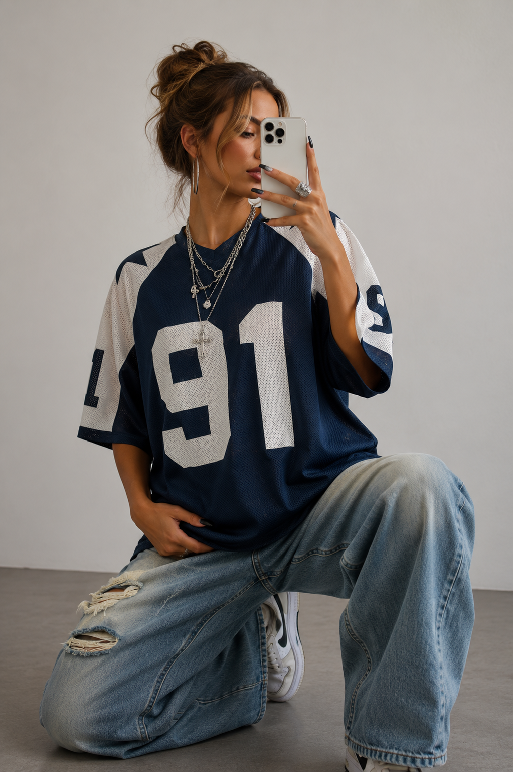 Women's oversized sporty top with unique print. Perfect for casual streetwear and relaxed summer style.