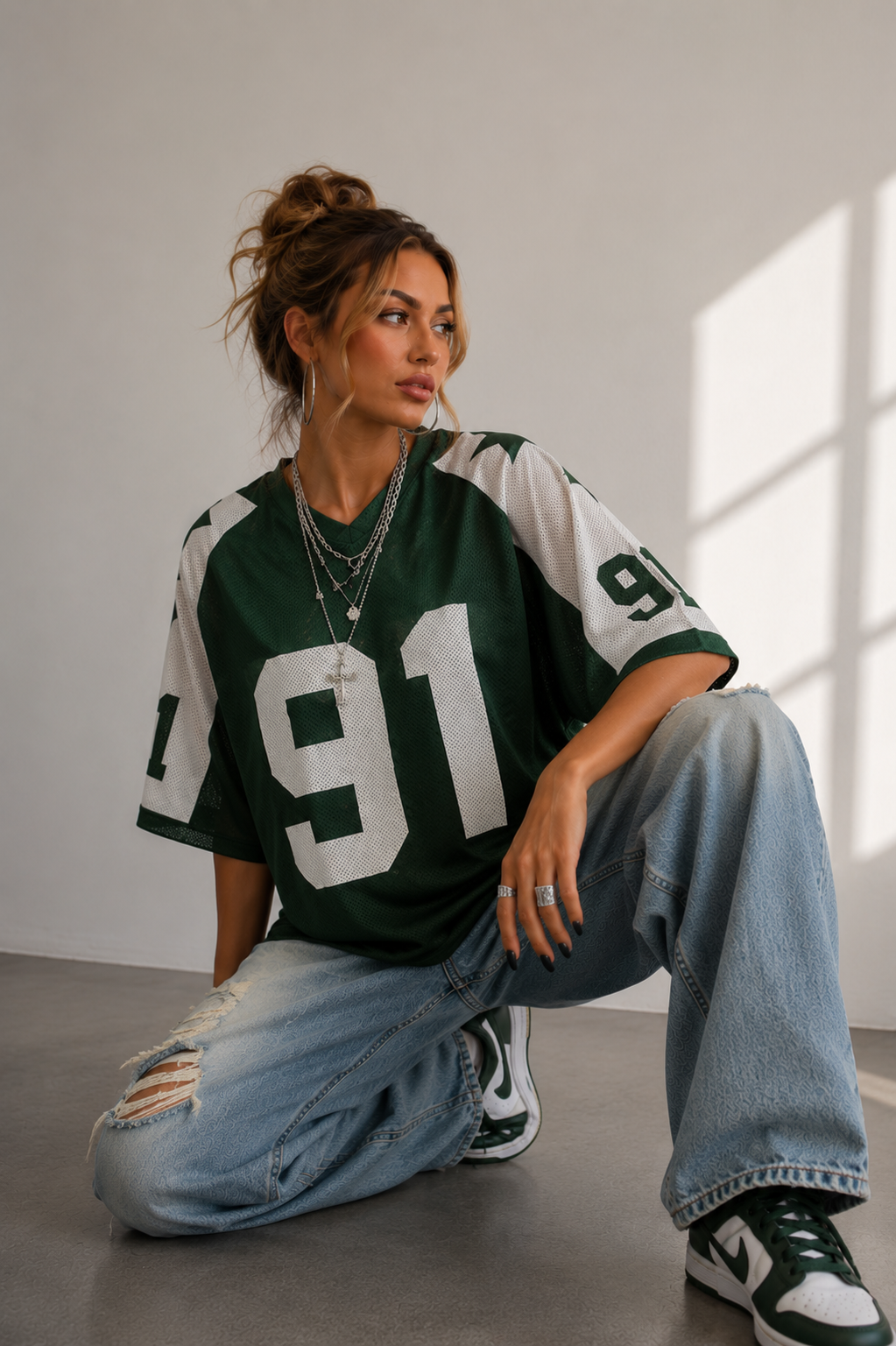 Stylish women's oversized printed top. A comfortable, sporty shirt for effortless casual and streetwear looks.