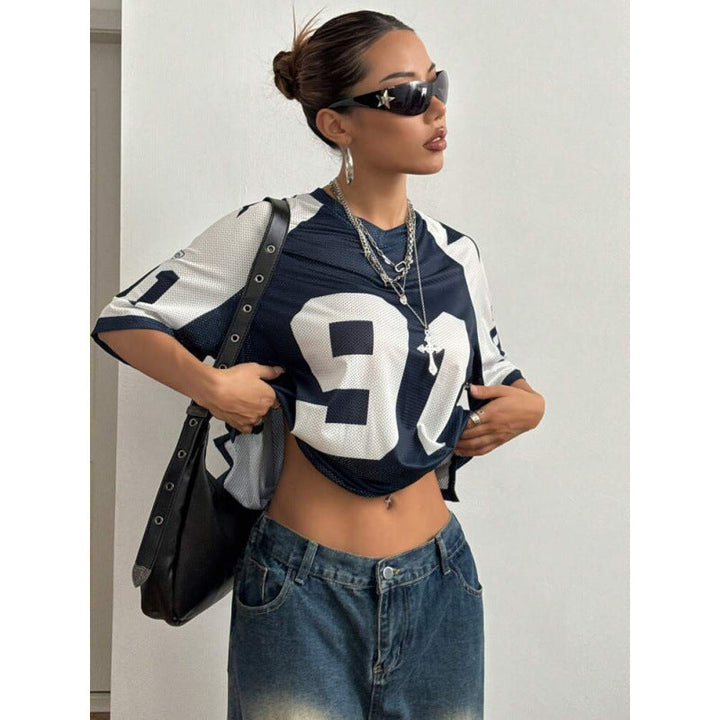 Women's sporty oversized top featuring a bold print. Ideal for comfortable casual and summer streetwear.