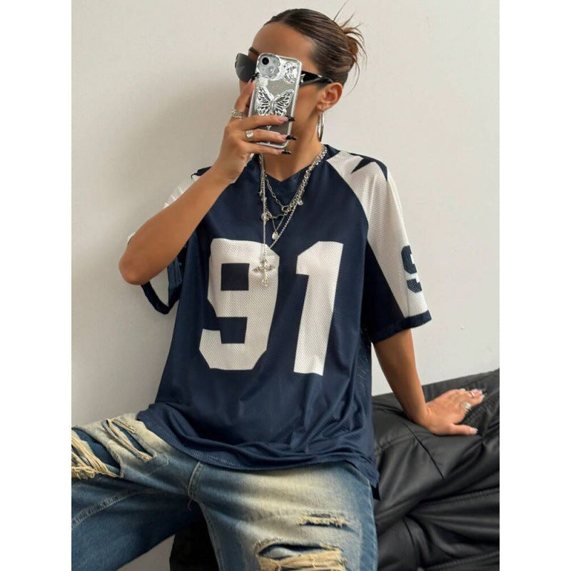 Printed women's relaxed fit shirt, an oversized sporty top for versatile street style and comfort.