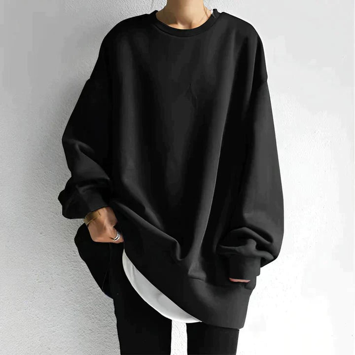 Women's oversized sweater with a relaxed fit, drop shoulder, and crew neck for chic comfort and everyday style.