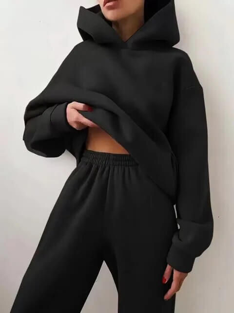 Women's oversized winter tracksuit set, a warm two-piece outfit for fashionable comfort.