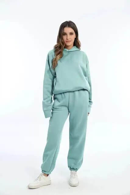 Comfortable women's oversized hoodie and matching sweatpants set, perfect for casual wear.