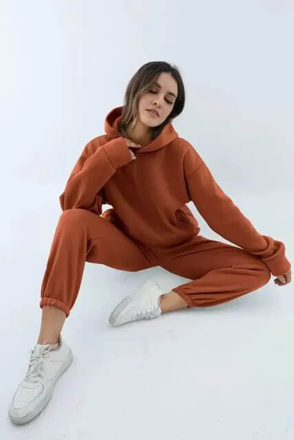 Chic women's two-piece tracksuit, a stylish and cozy oversized loungewear set for winter fashion.