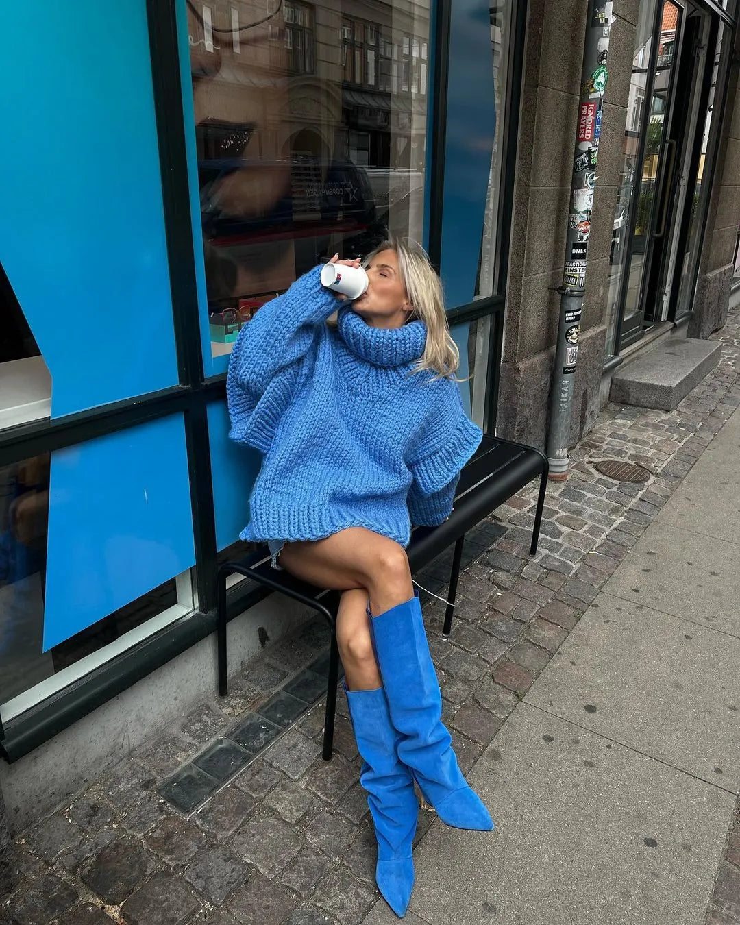 Relaxed fit women's oversized turtleneck mini dress, a stylish long sleeve sweater dress.