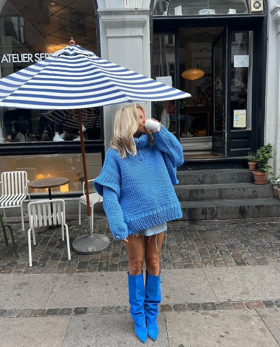 Versatile women's oversized turtleneck sweater dress, great for casual or chic fall outfits.