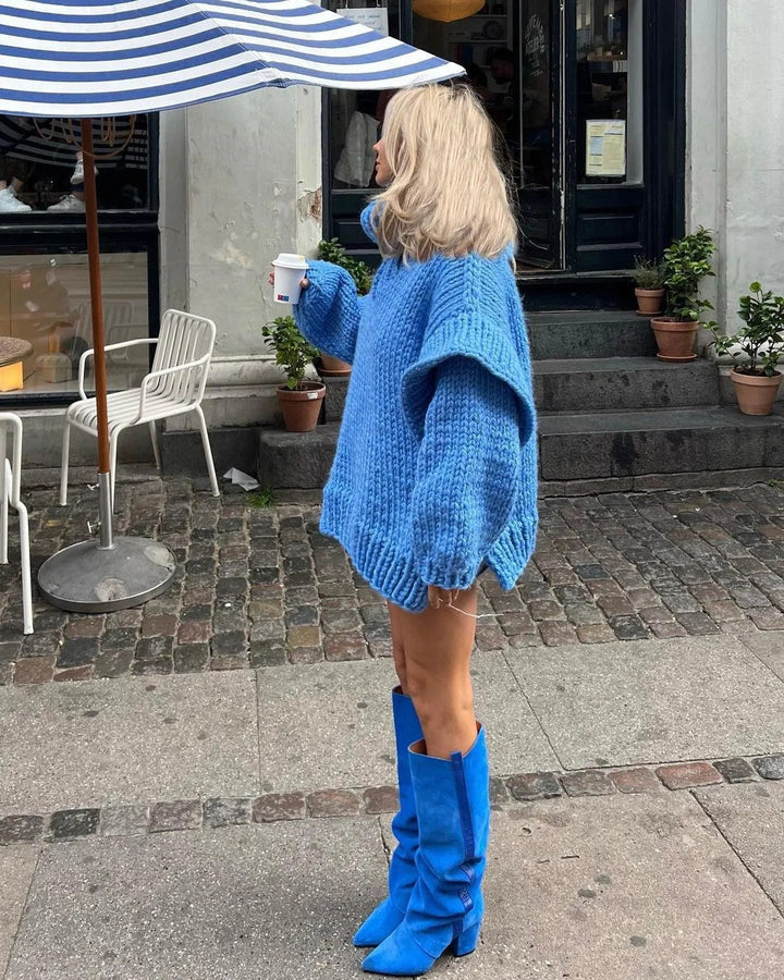 Soft knit women's oversized turtleneck sweater dress, a fashionable long sleeve mini for winter.