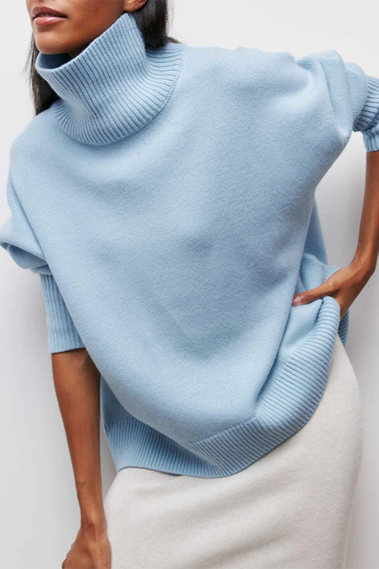 Women's oversized turtleneck sweater in a cozy knit, perfect for stylish fall and winter casual wear.
