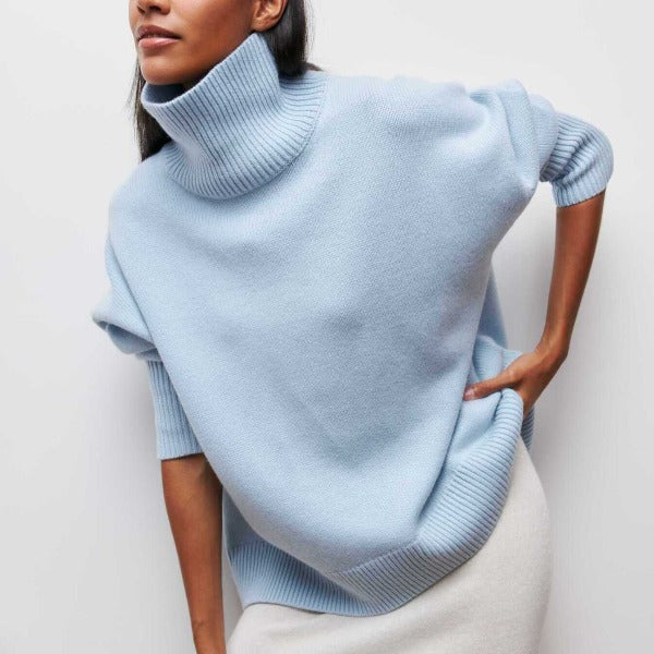 Women's oversized turtleneck sweater jumper. Cozy knit, relaxed fit, perfect for winter and autumn fashion.