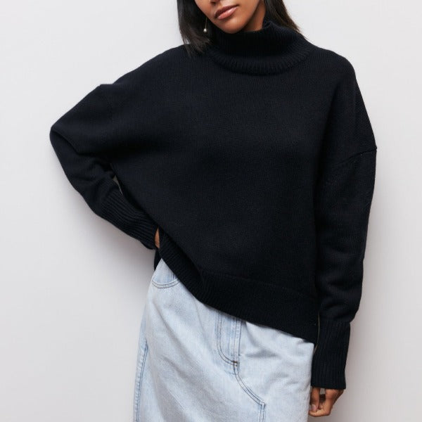 Fashionable women's oversized turtleneck sweater. Relaxed fit jumper, great for stylish layering & cozy winter/autumn outfits.