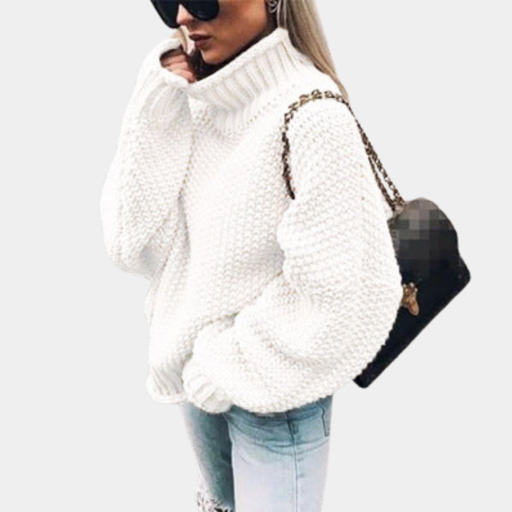 Women's oversized turtleneck sweater, perfect for cozy winter fashion & relaxed casual wear.
