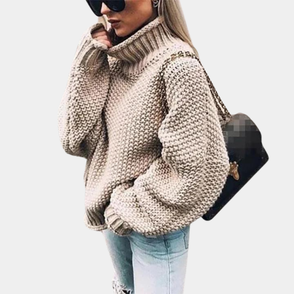 Stylish women's oversized turtleneck pullover sweater, warm & cozy for winter, relaxed fit.