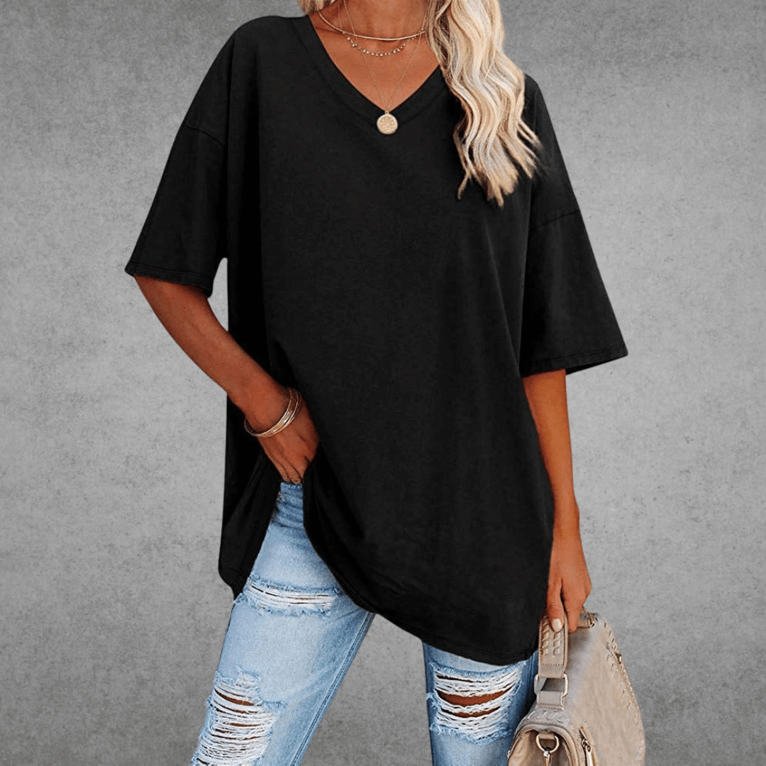 Women's oversized V-neck t-shirt with relaxed half sleeves for casual everyday style.