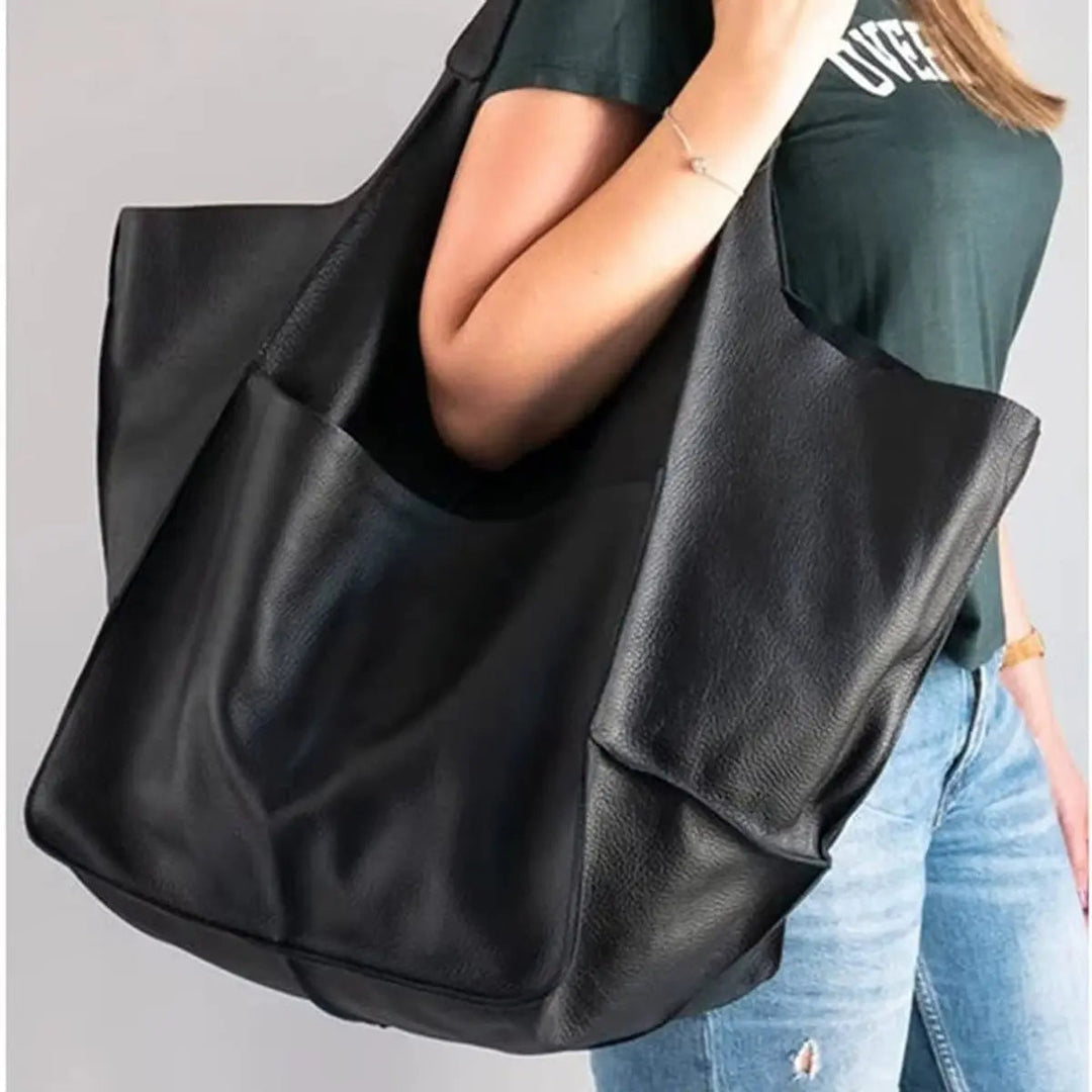 Professional women's oversized vegan leather work tote bag, magnetic closure, fits all essentials.
