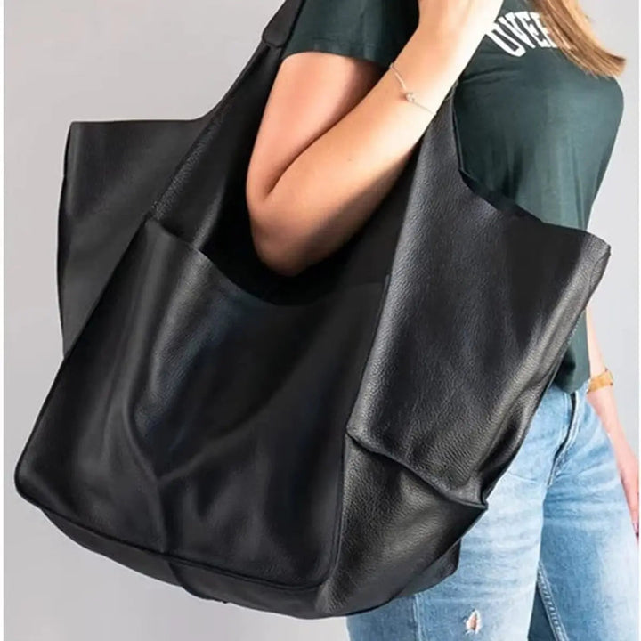 Professional women's oversized vegan leather work tote bag, magnetic closure, fits all essentials.
