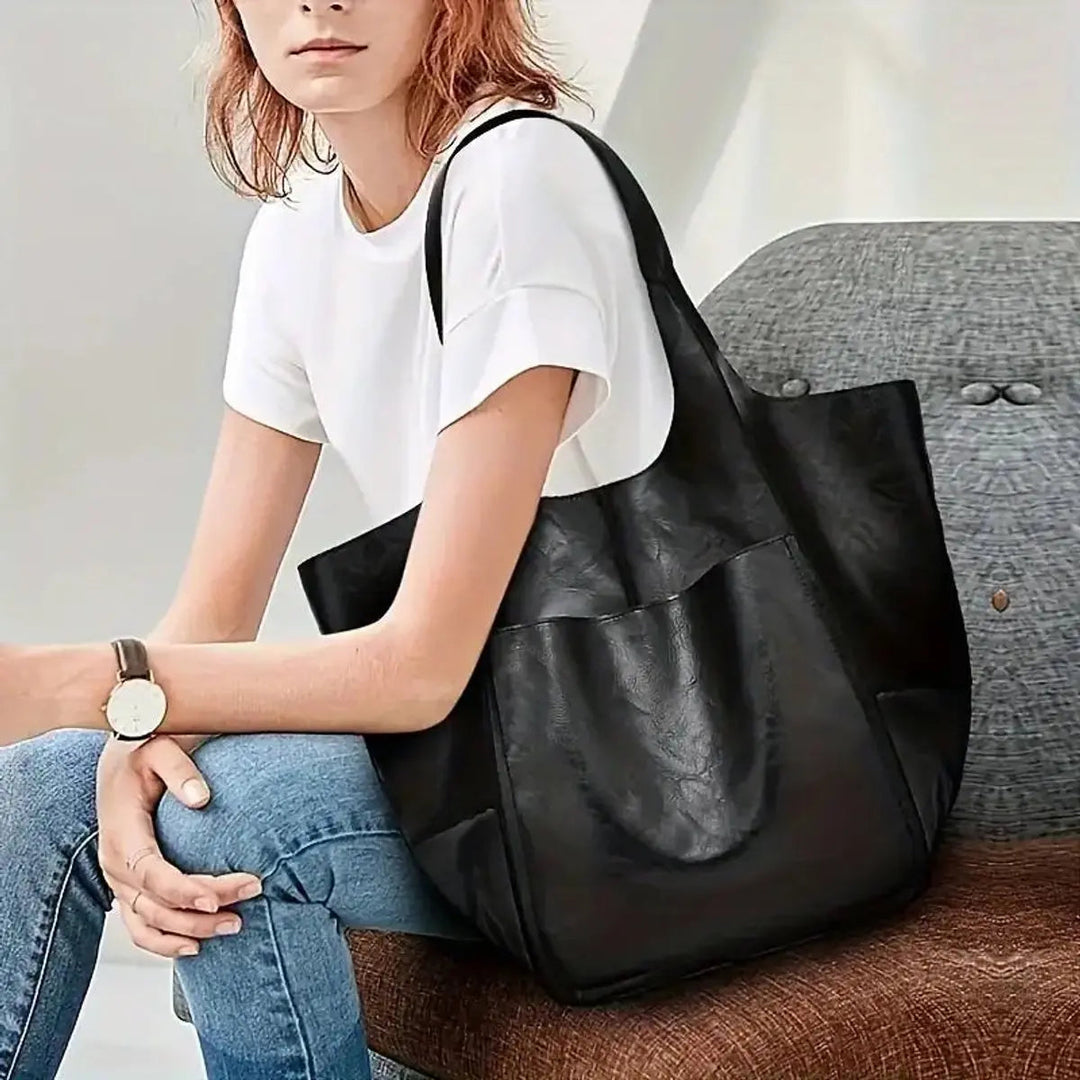 Trendy women's oversized vegan leather handbag, magnetic closure, a must-have fashion tote.