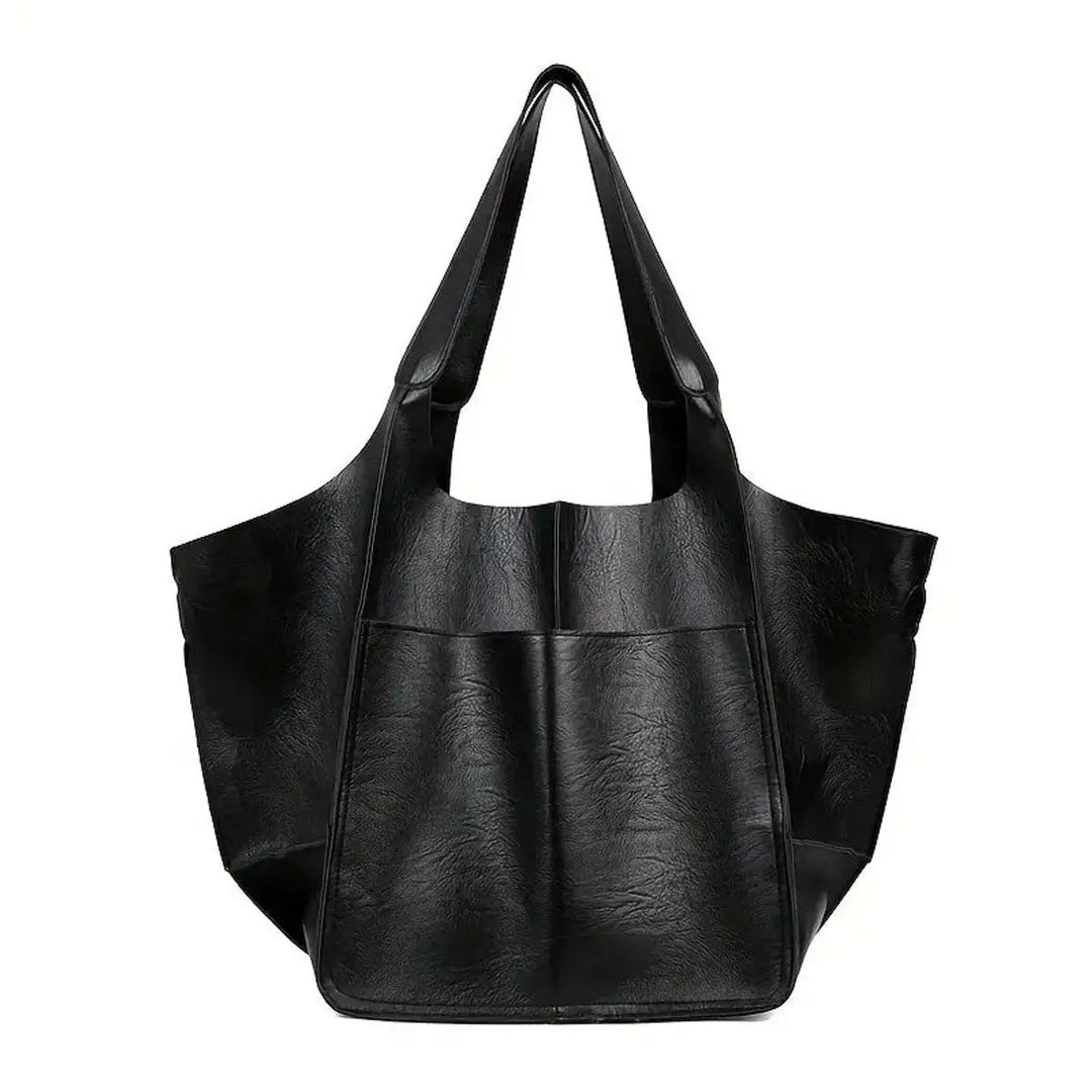 Premium vegan leather oversized tote for women, magnetic closure, durable everyday shoulder bag.