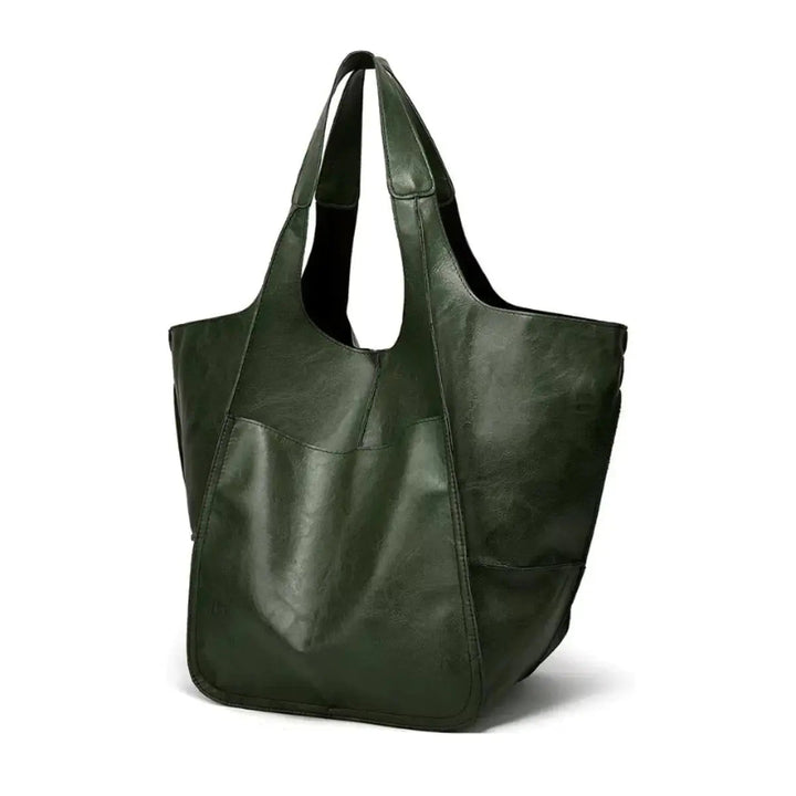 Statement oversized vegan leather tote bag for women, magnetic closure, chic shoulder handbag.