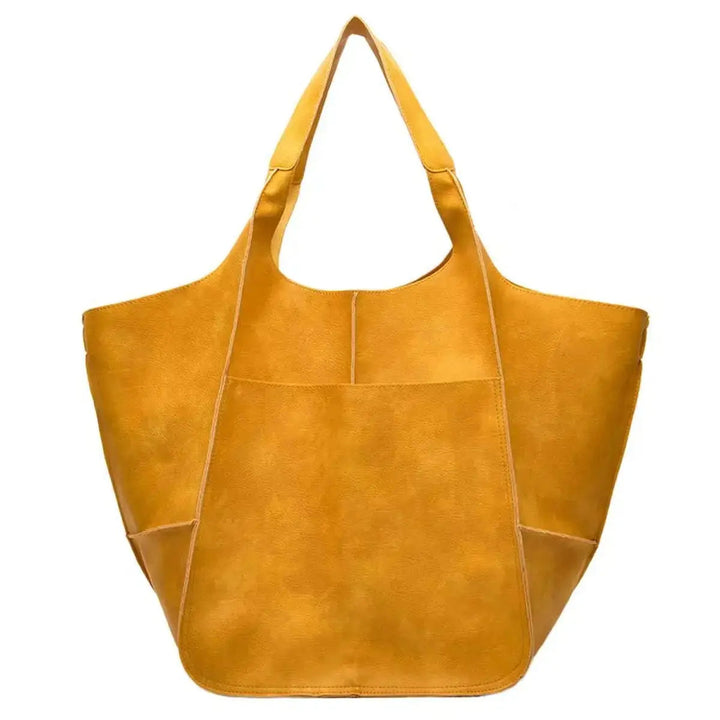 Everyday essential women's oversized vegan leather tote, magnetic closure, practical & stylish.