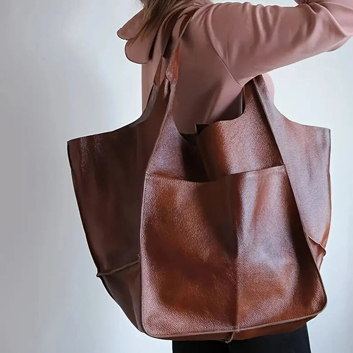 Women's large vegan leather shoulder bag with strong magnetic closure, perfect for daily essentials.