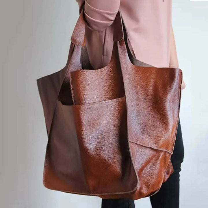 Women's vegan leather tote, oversized & magnetic closure, a spacious and elegant shoulder bag.