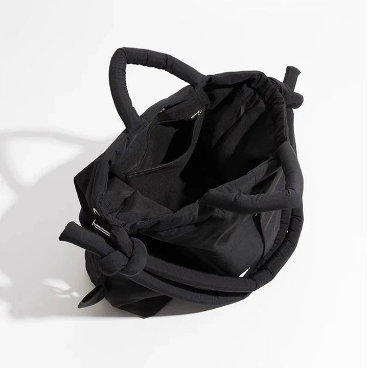 Stylish & lightweight women's drawstring tote bag. Padded everyday handbag, versatile for any occasion.