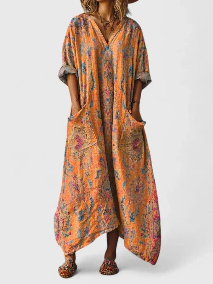 Women's paisley print oversized maxi dress with V-neck, 3/4-sleeves, and flowing bohemian style.