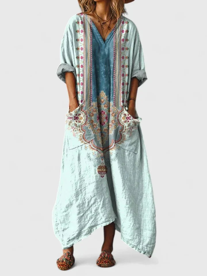 Vibrant paisley print oversized maxi dress for women, V-neck, 3/4-sleeves, offering bohemian comfort.