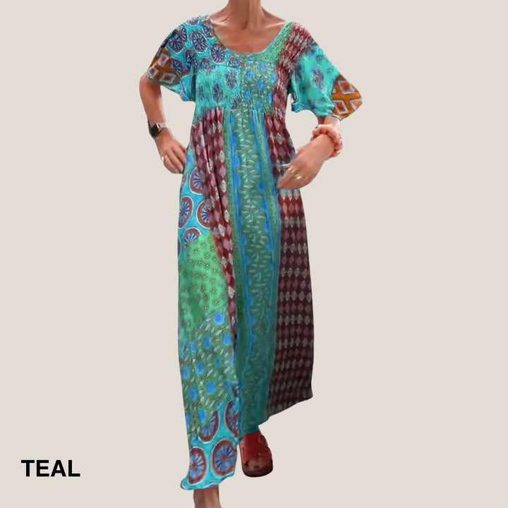 Elegant women's patchwork paisley midi dress, V-neck, smocked waist, short sleeve, flowing silhouette.