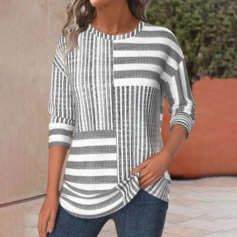 Women's patchwork striped blouse with 3/4 sleeves & crew neck, perfect for casual or elegant spring wear.