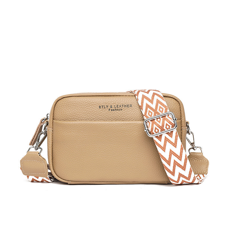 Carry essentials in style with this women's pebbled leather crossbody bag, featuring an adjustable shoulder strap.