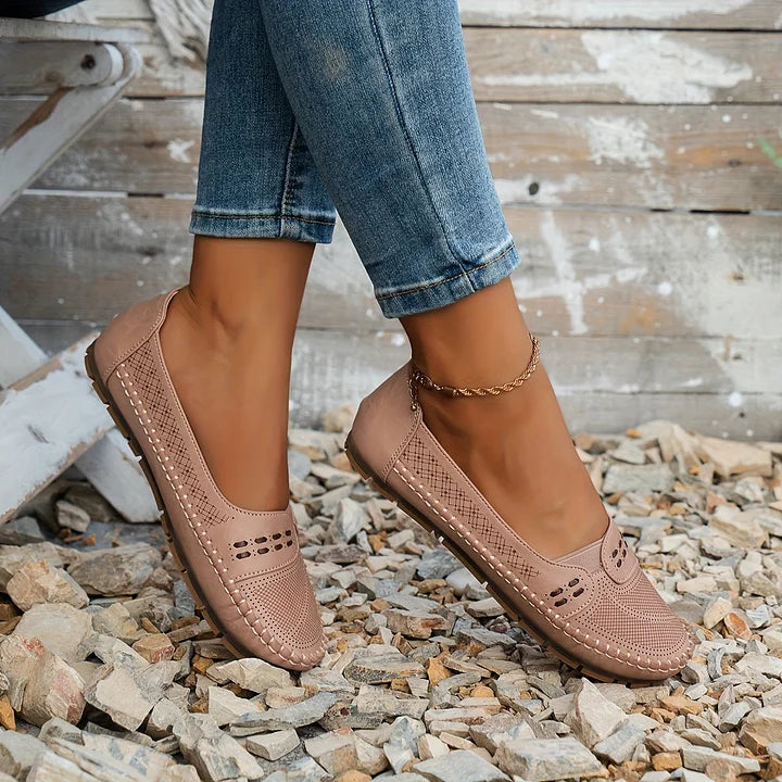 Comfortable women's perforated slip-on loafers for casual walking & summer travel.